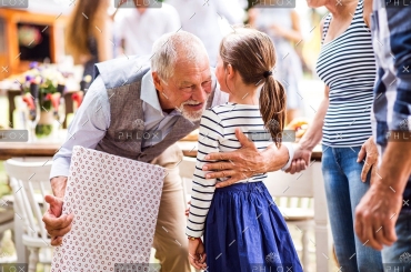 demo-attachment-7-family-celebration-or-a-garden-party-outside-in-PVHU9JN